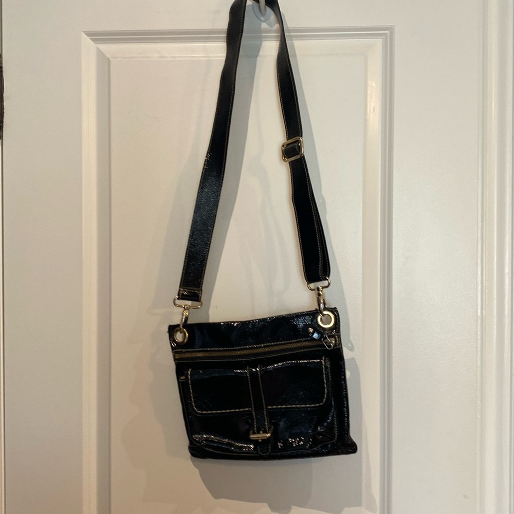 Place leather roots purse